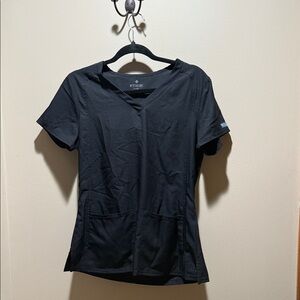 Set of Women's scrubs.  2 shirts, 3 pants. Being sold together.